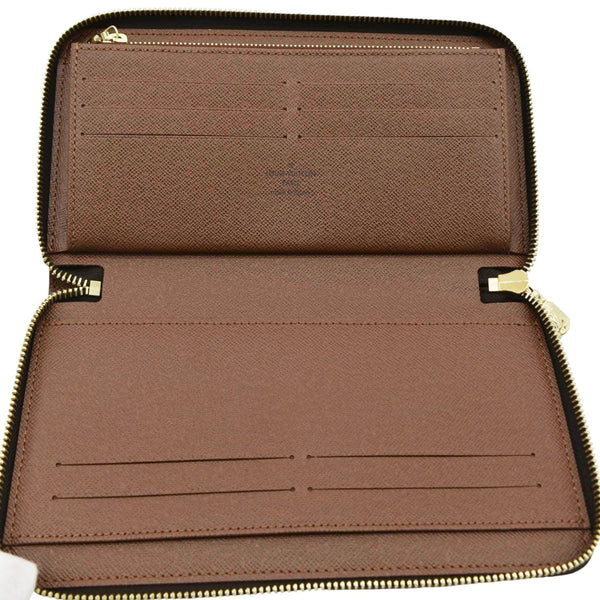 LOUIS VUITTON Monogram Canvas Zippy Wallet Brown