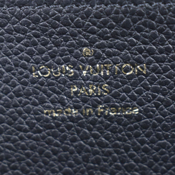 LOUIS VUITTON Zip Around Monogram Empreinte Leather Wallet Bicolor
