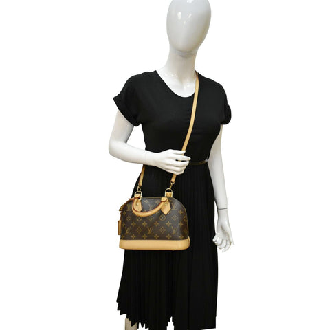 LOUIS VUITTON Alma BB Monogram Canvas Crossbody Bag Brown dummy look