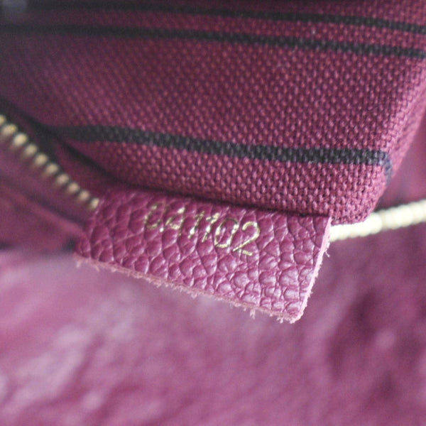 LOUIS VUITTON Artsy MM Empreinte Leather Hobo Bag Raisin