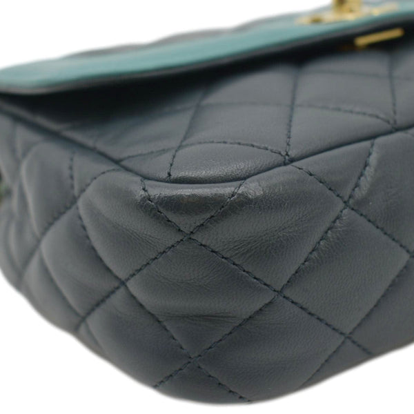 CHANEL Black pebble leather crossbody bag with gold chain