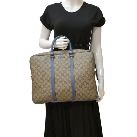 GUCCI Brown paper bag with blue stars