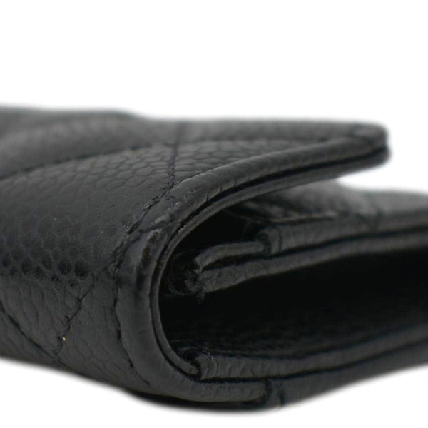 CHANEL Black Quilted Caviar Leather hand bag front left border view