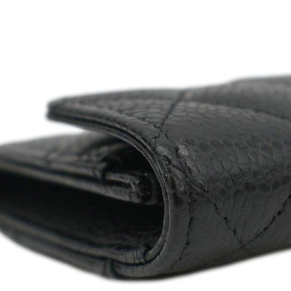 CHANEL Black Quilted Caviar Leather hand bag front right border view