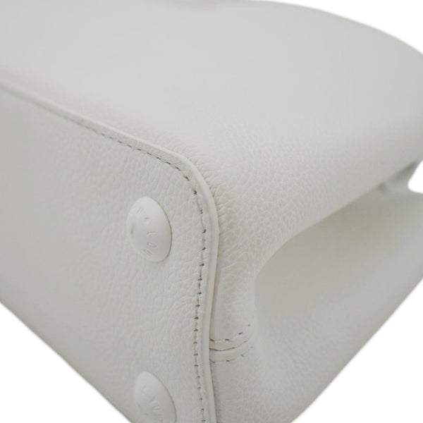 LOUIS VUITTON White leather tote bag with gold chain straps