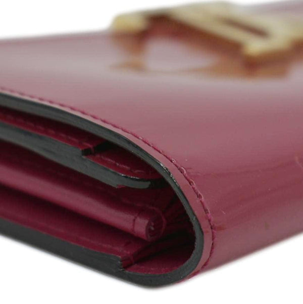 LOUIS VUITTON Brown leather tote bag with double snap closure