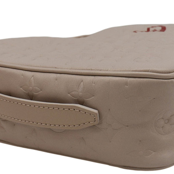 LOUIS VUITTON Fall In Love Sac Coeur Monogram Embossed Crossbody Bag Light Pink