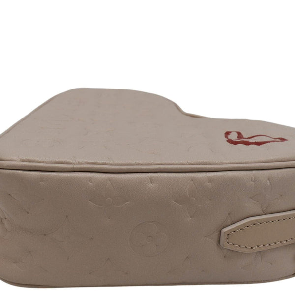 LOUIS VUITTON Fall In Love Sac Coeur Monogram Embossed Crossbody Bag Light Pink