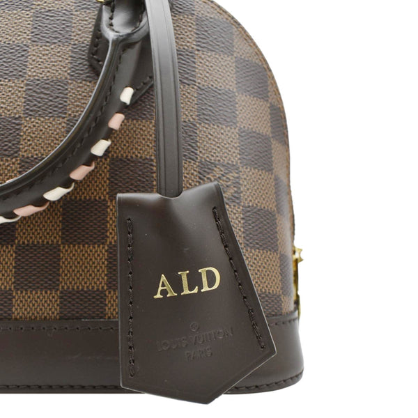 LOUIS VUITTON Braided Alma BB Damier Ebene Satchel Bag Brown