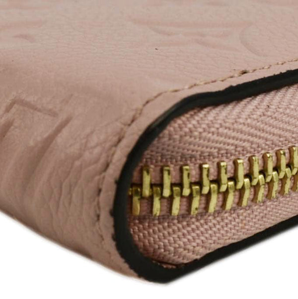 LOUIS VUITTON Clemence Empreinte Leather Wallet Dusty Pink