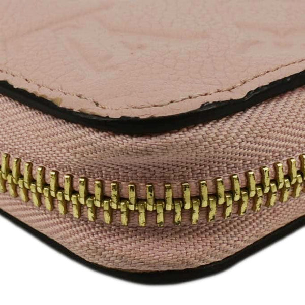LOUIS VUITTON Clemence Empreinte Leather Wallet Dusty Pink