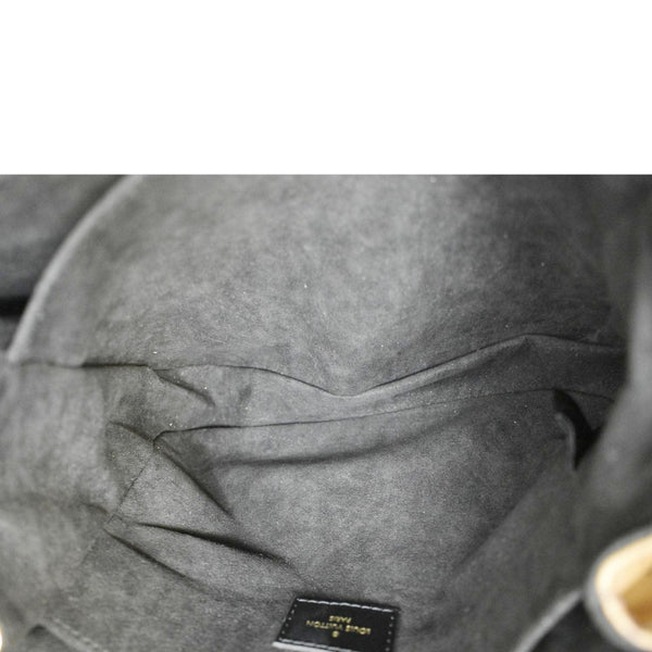 LOUIS VUITTON Metis Pochette Reverse Monogram Canvas Crossbody Bag Brown