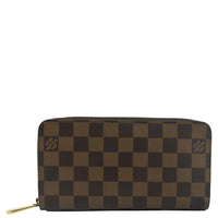 LOUIS VUITTON Damier Ebene Zippy Wallet Brown