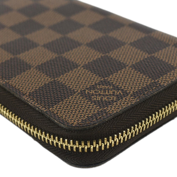 LOUIS VUITTON Damier Ebene Zippy Wallet Brown