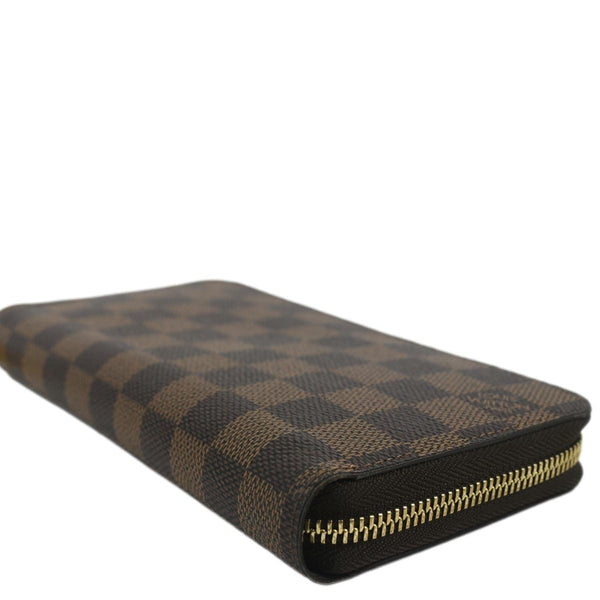 LOUIS VUITTON Damier Ebene Zippy Wallet Brown