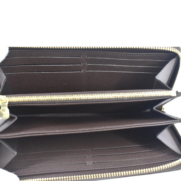 LOUIS VUITTON Damier Ebene Zippy Wallet Brown