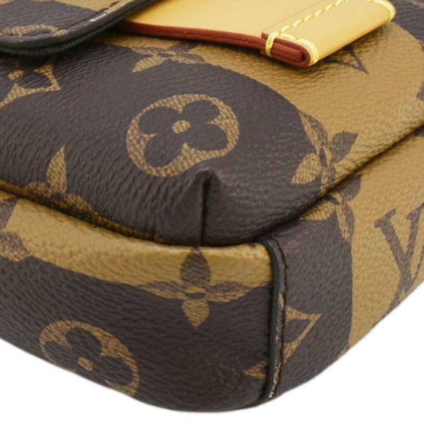 LOUIS VUITTON x Nigo Double Flap Reverse Monogram Canvas Phone Pouch Brown