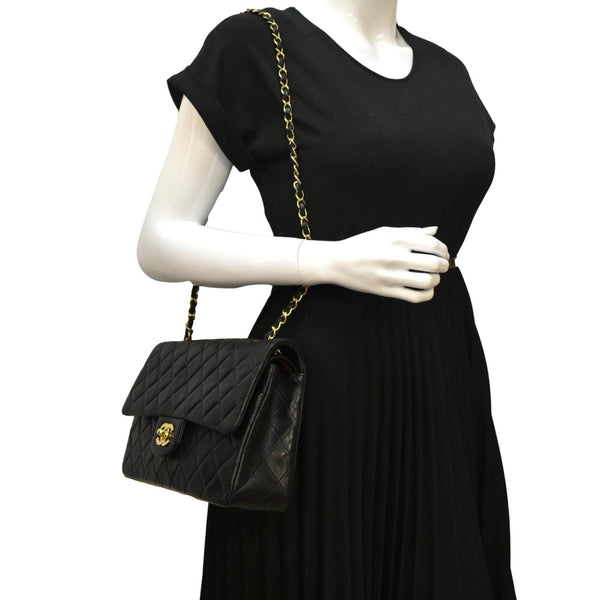 CHANEL Classic Vintage Black Quilted Leather Shoulder Bag with body view