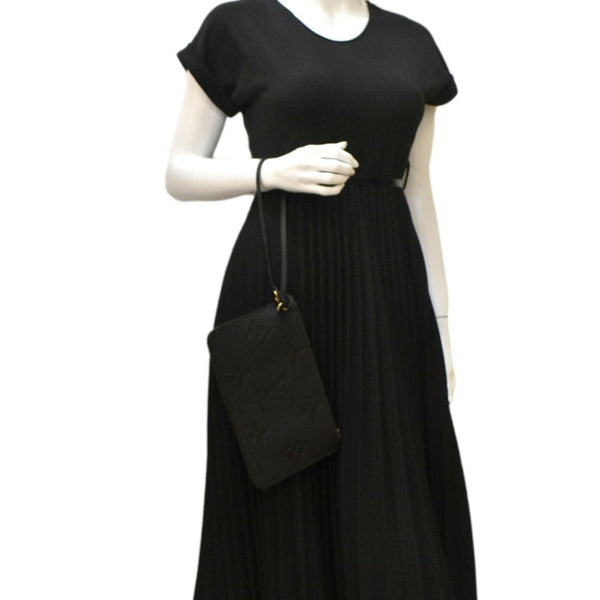 LOUIS VUITTON Neverfull Empreinte Monogram Pochette Wristlet Pouch Black