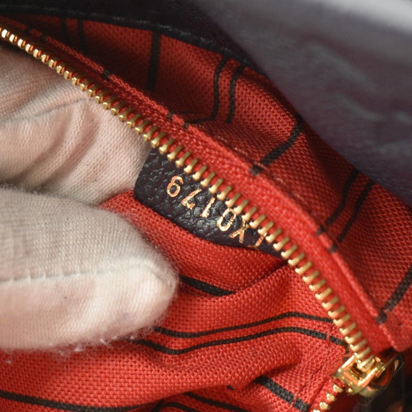 LOUIS VUITTON Artsy MM Monogram Empreinte Leather Shoulder Bag Navy Blue