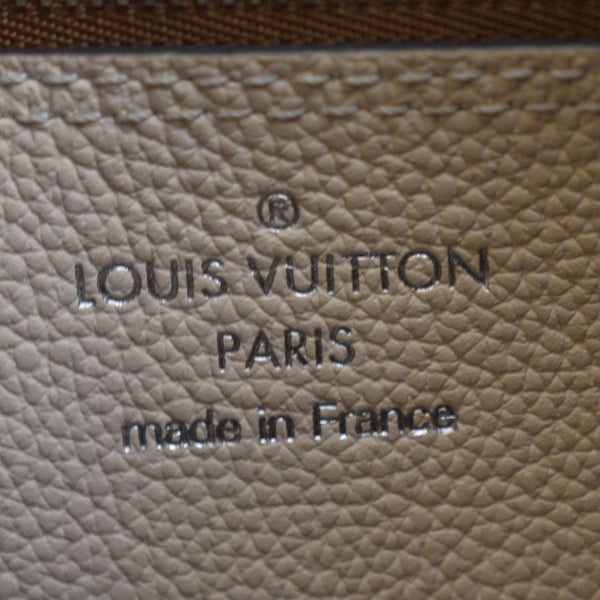 LOUIS VUITTON Carmel Mahina Leather Hobo Bag Creme