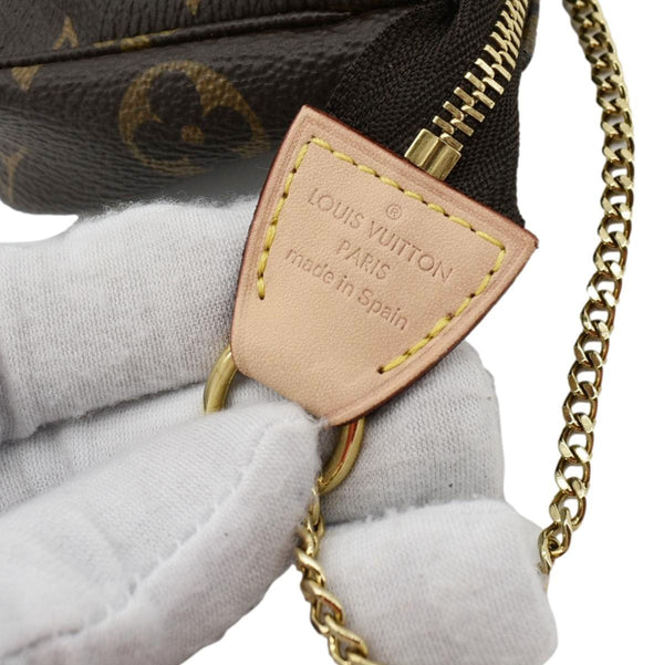 LOUIS VUITTON Mini Pochette Monogram Canvas Accessoires Pouch Brown