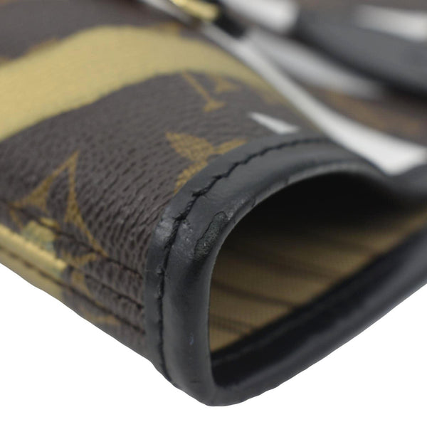 LOUIS VUITTON X LOL Neverfull MM Monogram Canvas Bag with left side view