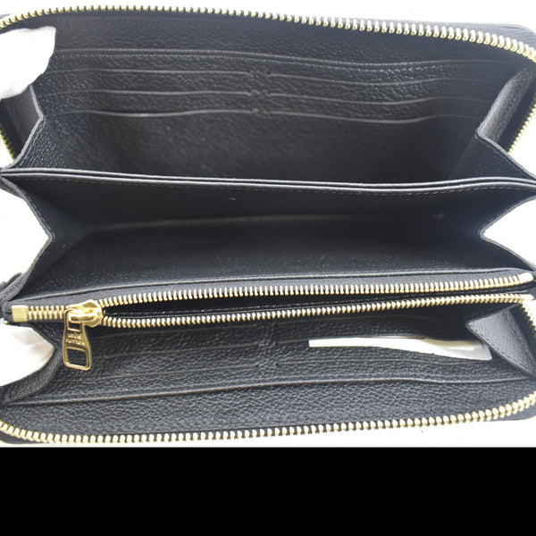 LOUIS VUITTON Bicolor Monogram Empreinte Leather Zippy Wallet Black