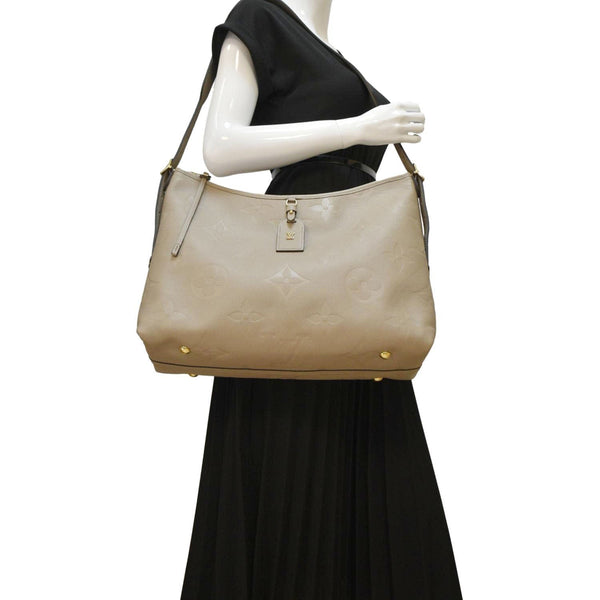 LOUIS VUITTON Carryall MM Monogram Empreinte Shoulder Bag Tourterelle Gray