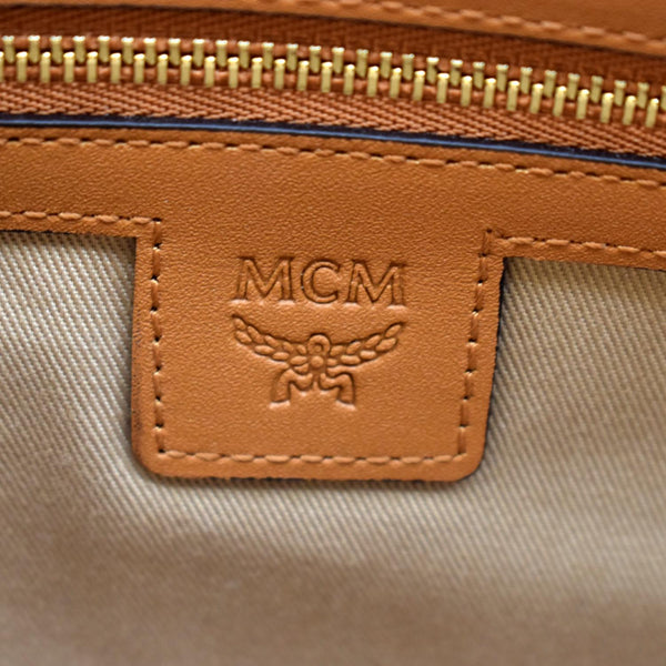 MCM Visetos Monogram Coated Canvas Clutch Pouch Cognac