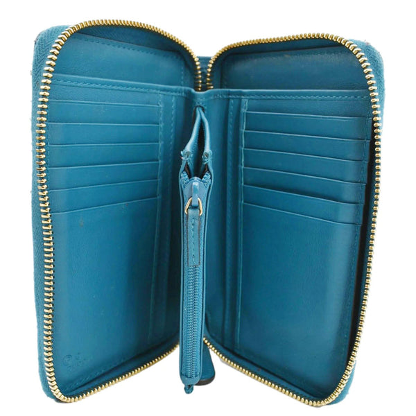 GUCCI Zip Around GG Embossed Leather Wallet Deep Cobalt