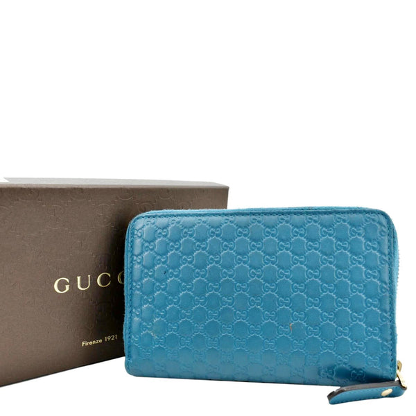 GUCCI Zip Around GG Embossed Leather Wallet Deep Cobalt