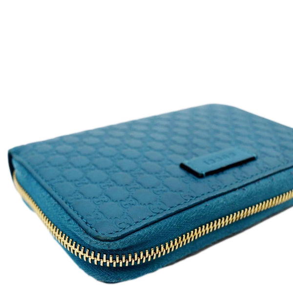 GUCCI Zip Around GG Embossed Leather Wallet Deep Cobalt