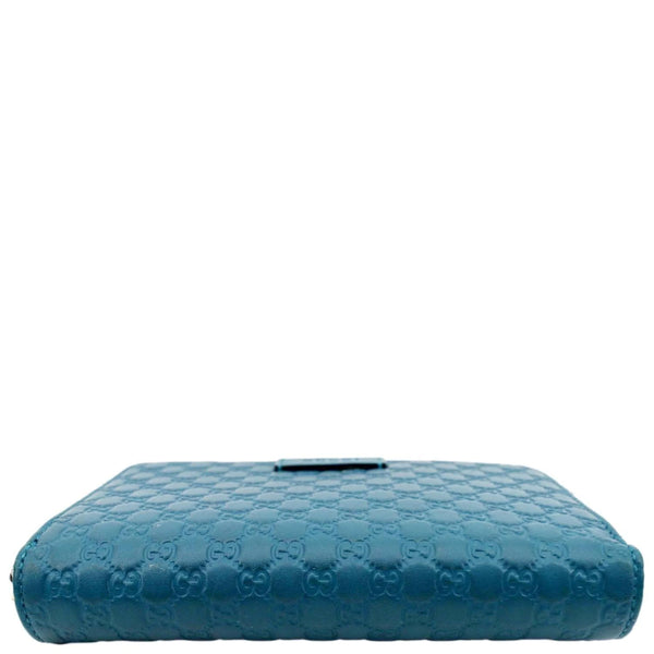 GUCCI Zip Around GG Embossed Leather Wallet Deep Cobalt