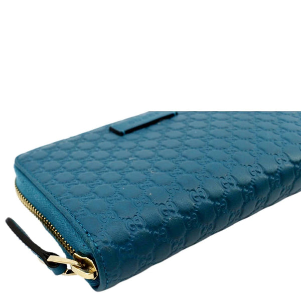 GUCCI Zip Around GG Embossed Leather Wallet Deep Cobalt