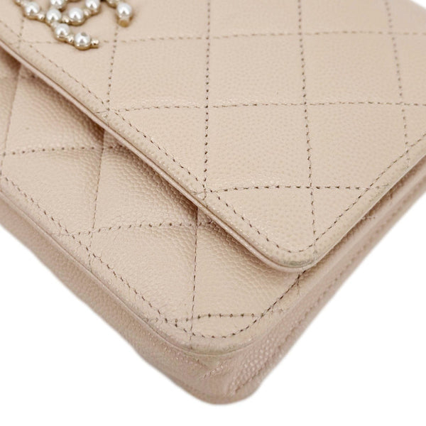 CHANEL CC Pearl Caviar Quilted Leather WOC Crossbody Bag Off white