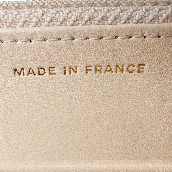 CHANEL CC Pearl Caviar Quilted Leather WOC Crossbody Bag Off white