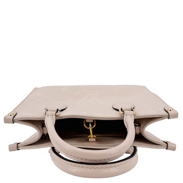 LOUIS VUITTON Onthego PM Giant Monogram Empreinte Leather Satchel Bag Cream