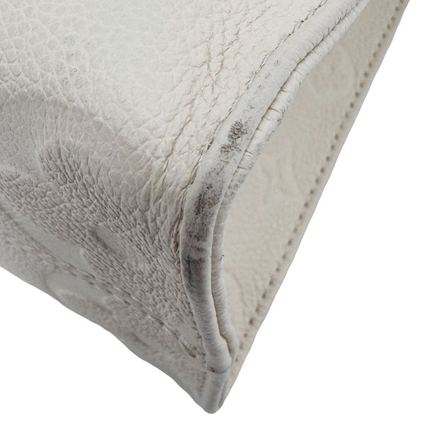 LOUIS VUITTON Onthego PM Giant Monogram Empreinte Leather Satchel Bag Cream