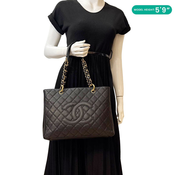 CHANEL Grand Shopping Quilted Leather Black Tote Bag - Model Holding