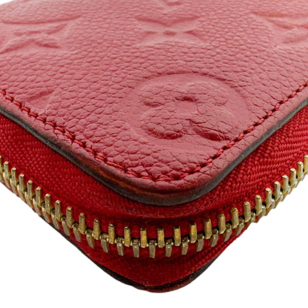 LOUIS VUITTON Clemence Monogram Empreinte Leather Wallet Red