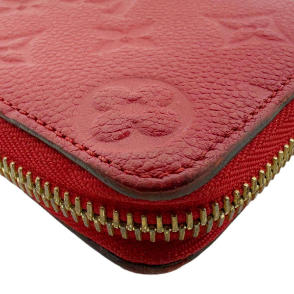 LOUIS VUITTON Clemence Monogram Empreinte Leather Wallet Red