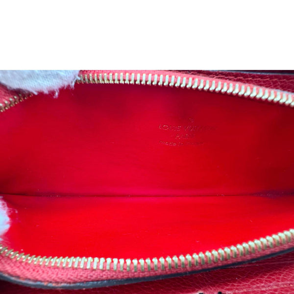 LOUIS VUITTON Clemence Monogram Empreinte Leather Wallet Red