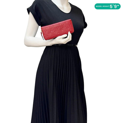 LOUIS VUITTON Clemence Monogram Empreinte Leather Wallet Red