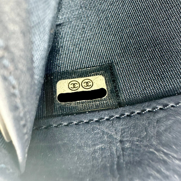 CHANEL Boy Quilted Calfskin Leather Zip Around Wallet Blue