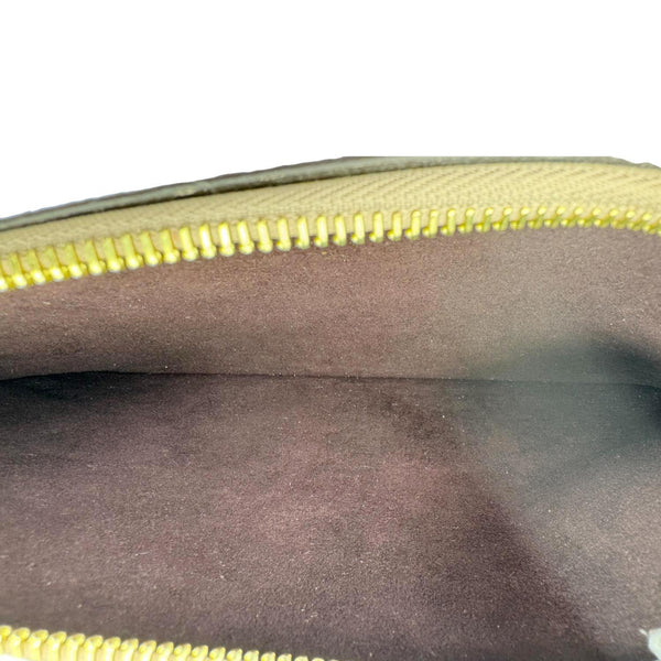 LOUIS VUITTON Empreinte Monogram Leather Wristlet Beige