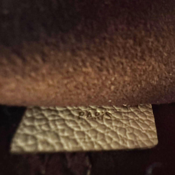 LOUIS VUITTON Empreinte Monogram Leather Wristlet Beige