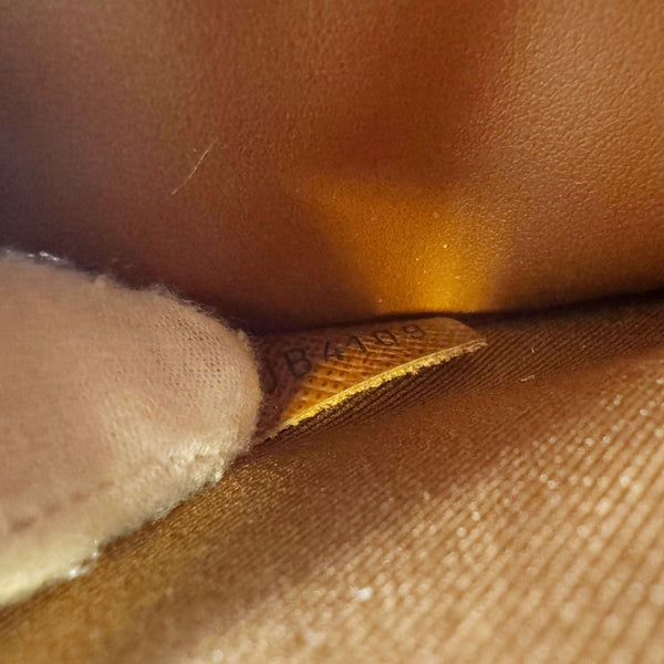 LOUIS VUITTON Legacy Monogram Canvas Chain Clutch Brown