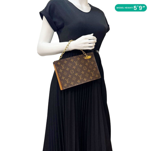 Louis Vuitton Legacy Brown Monogram Canvas Chain Clutch - Model Carrying