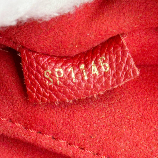 LOUIS VUITTON Saint Germain Monogram Empreinte Leather Crossbody Bag Red